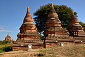 The cluster of red brick temples, named Khay-min-gha on the map on the North plain of Bagan. Myanmar. 